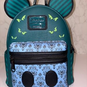 Mickey’s Main Attraction Haunted Mansion Loungefly